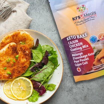 KFS Rx Meals - Keto Bake Cajun Chicken Coating Mix package beside freshly prepared Cajun chicken on a salad.